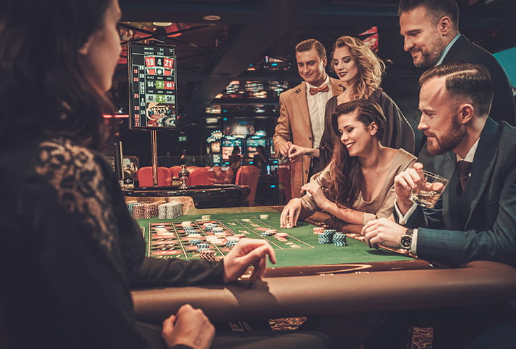 A group of young people playing on the roulette