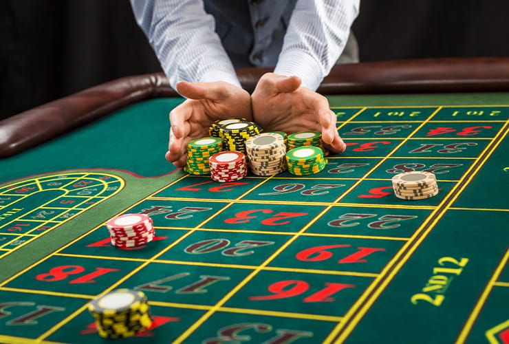 Placing a large quantity of chips on a given number at the roulette table